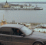 Территория возле Александро-Невского собора сильно изменилась. Порт убрали, площадку благоустроили. За храмом появился футбольный стадион, рядом строится ледовый дворец. В BMW в ожидании Легавого сидят Саймон и Серега. - Газета Грани